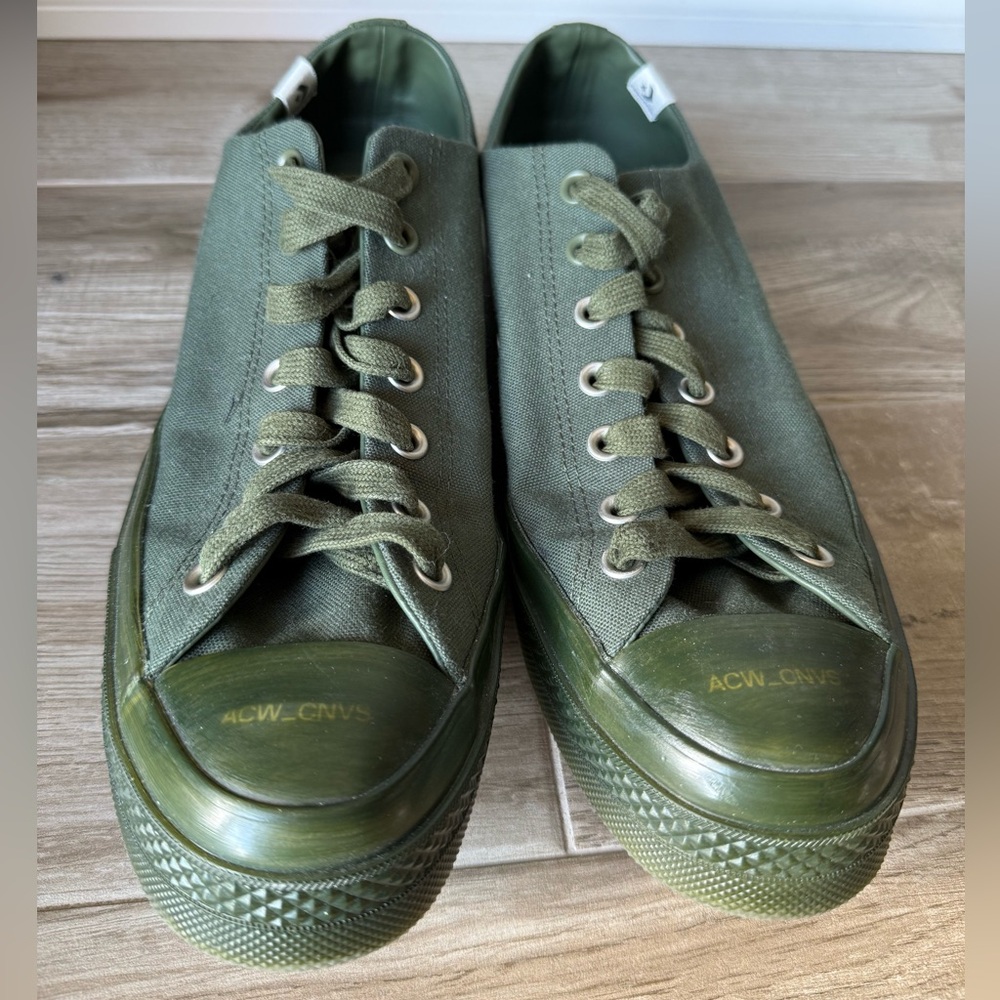 Converse teamed with ACW/ A Cold Wall.
Olive Green Low-Top Sneakers
